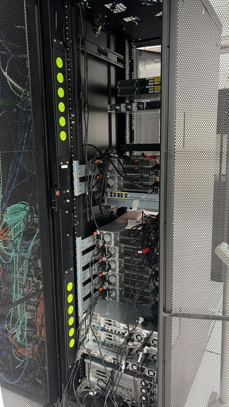 ONE WORLD LOGIX data center cabling cleanup and rack reconfiguration project
